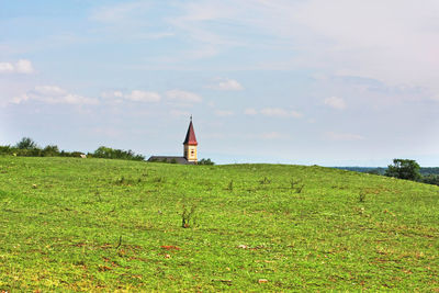 View of landscape against cloudy sky