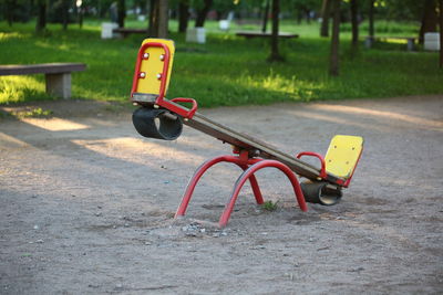 Empty park bench on playground