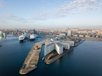 High angle view of boats in city