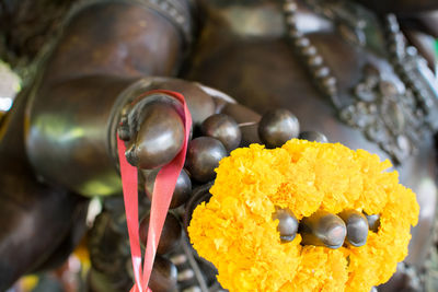 Close-up of yellow chili peppers for sale in market