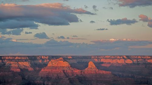 Scenic view of landscape against sky during sunset