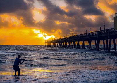 Scenic view of sea at sunset