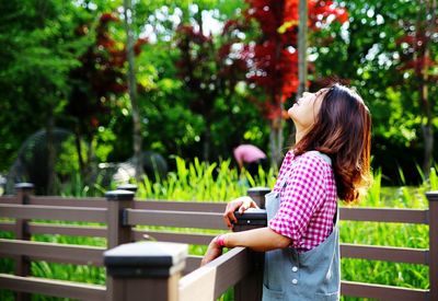 Woman standing in garden