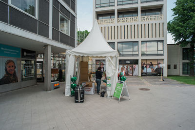 People in front of building