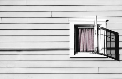 Window decoration on white wooden house