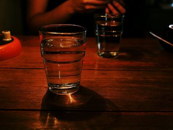 Close-up of beer glass on table