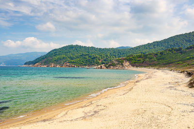 Scenic view of beach against sky