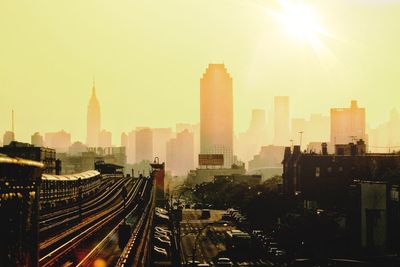 Panoramic view of buildings against sky during sunset