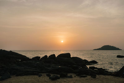 Scenic view of sea against sky during sunset