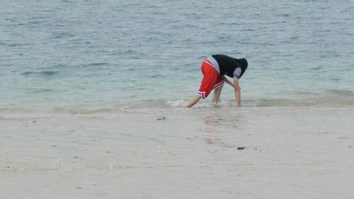 Full length of man on beach