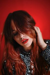 Close-up of young woman looking away