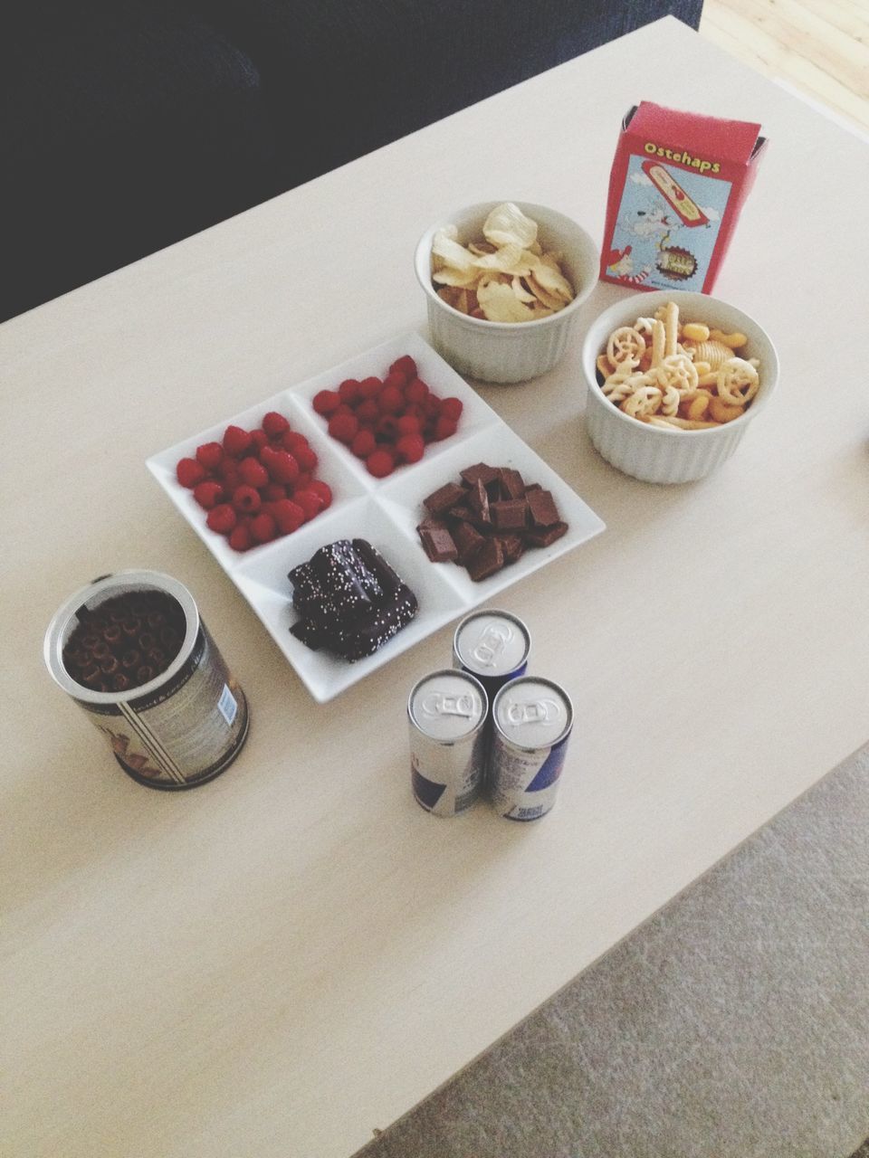 indoors, food and drink, table, high angle view, still life, food, freshness, plate, sweet food, dessert, ready-to-eat, directly above, coffee cup, drink, no people, unhealthy eating, indulgence, refreshment, cake, close-up