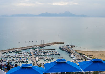 High angle view of harbor against sky