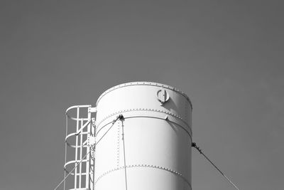 Low angle view of silo against clear sky