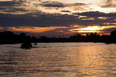 Scenic view of sunset over river