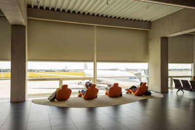 Group of people sitting on floor