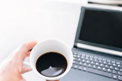 Coffee cup on table