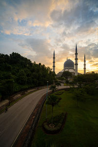 View of mosque against sky during sunset