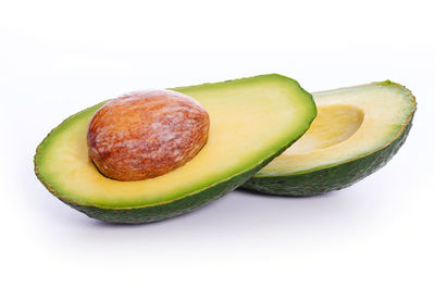 Close-up of fruits against white background