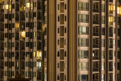 Full frame shot of modern building at night