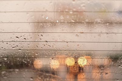 Full frame shot of wet window in rainy season