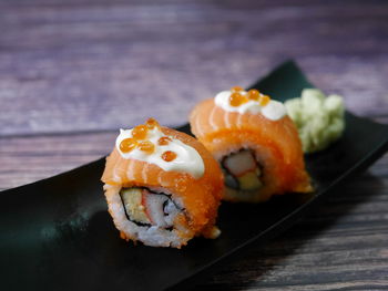 Close-up of sushi served on table