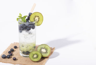 Close-up of drink against white background