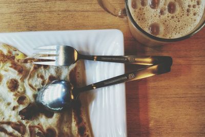 Directly above shot of paratha and teh tarik on table