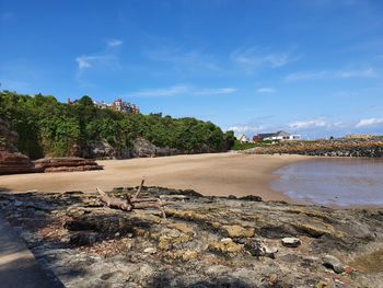 Scenic view of beach against sky