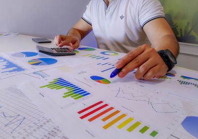 Low section of person working on table