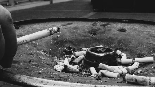 High angle view of people smoking cigarette on water