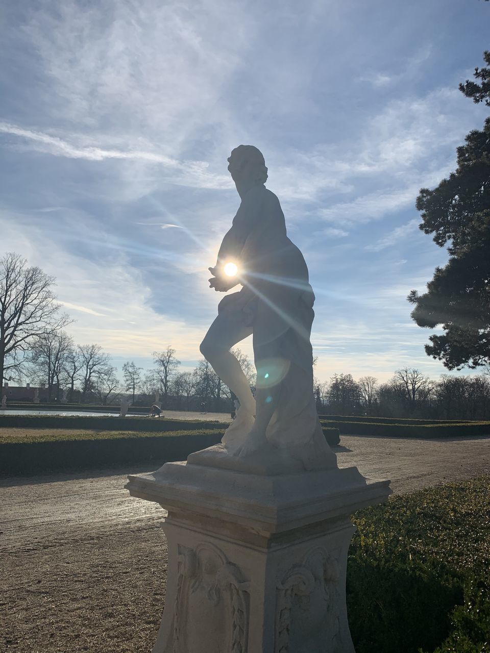 STATUE OF ANGEL AGAINST SKY