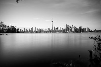 Scenic view of lake ontario in city against sky