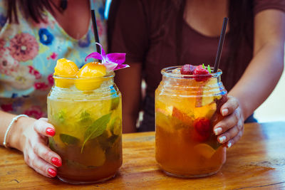 Close-up of drink in glass jar on table