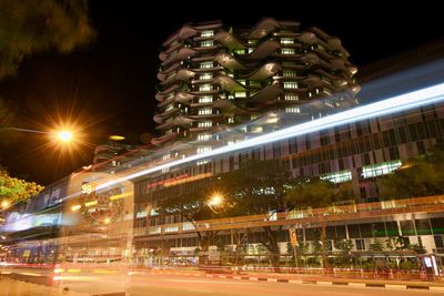 Light trails on city street at night