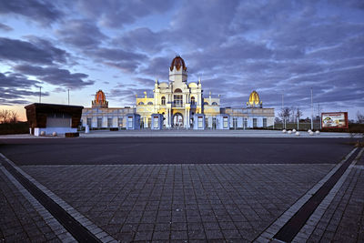 View of building against cloudy sky