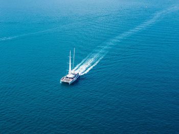 High angle view of sailboat sailing on sea