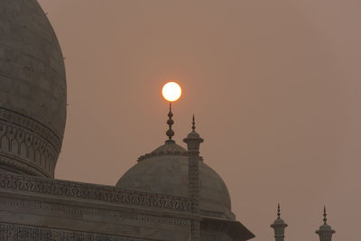 Low angle view of church against sky during sunset