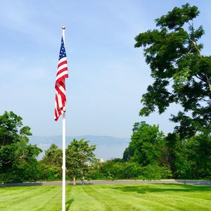 American flag against clear blue sky