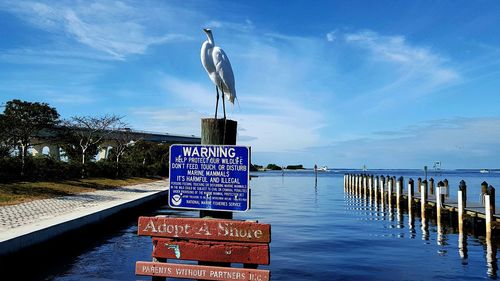 Information sign in water