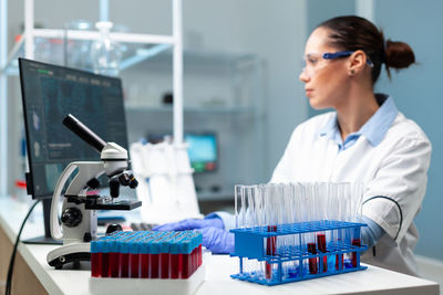 Young scientist working at laboratory