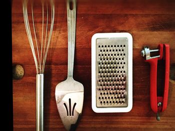 Directly above view of kitchen utensils on table