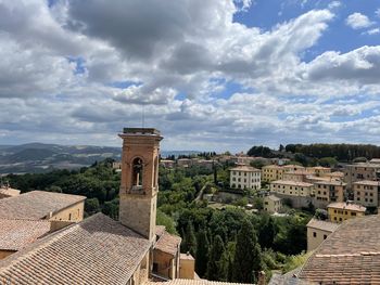High angle view of townscape against cloudy sky