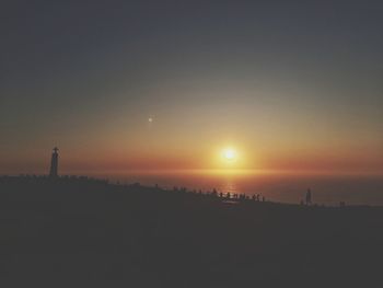 Scenic view of silhouette landscape against sky during sunset