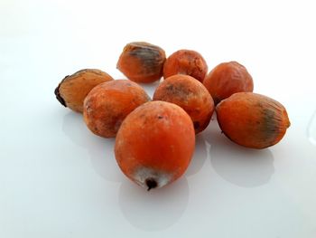 High angle view of fruits on white background