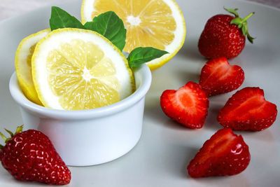 Close-up of fruits in bowl on table