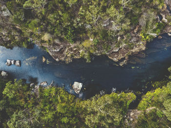 High angle view of river amidst rocks