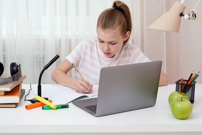 Girl attending online class