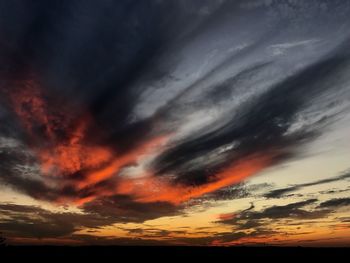 Scenic view of dramatic sky during sunset