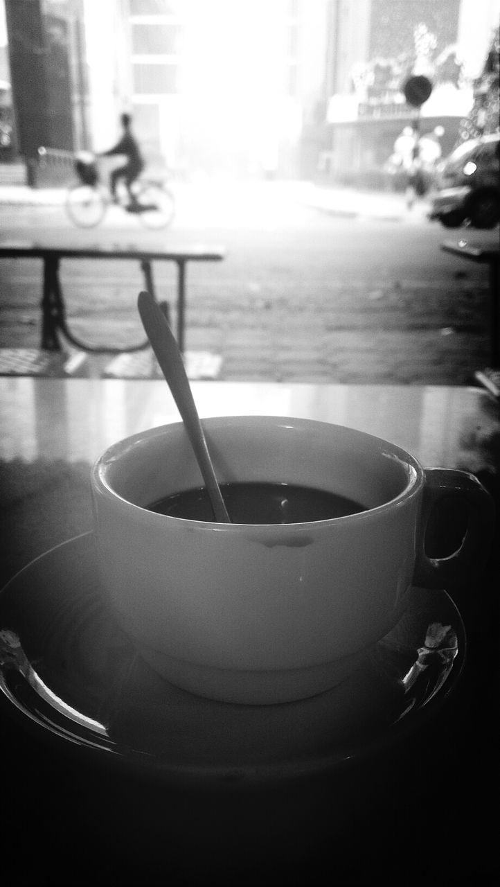 indoors, drink, table, refreshment, close-up, focus on foreground, food and drink, reflection, glass - material, incidental people, transparent, still life, cafe, no people, drinking glass, transportation, selective focus, restaurant, empty, car